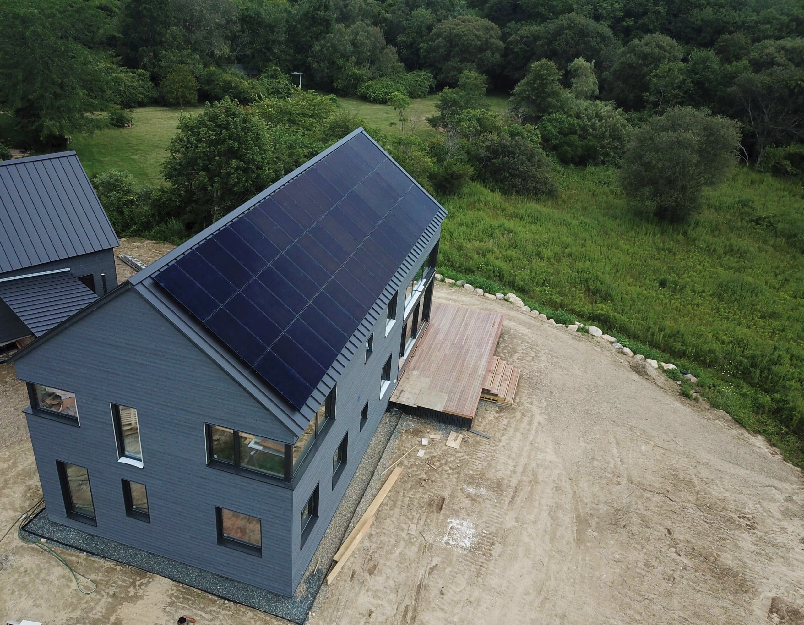 Grey house with solar panels on the roof