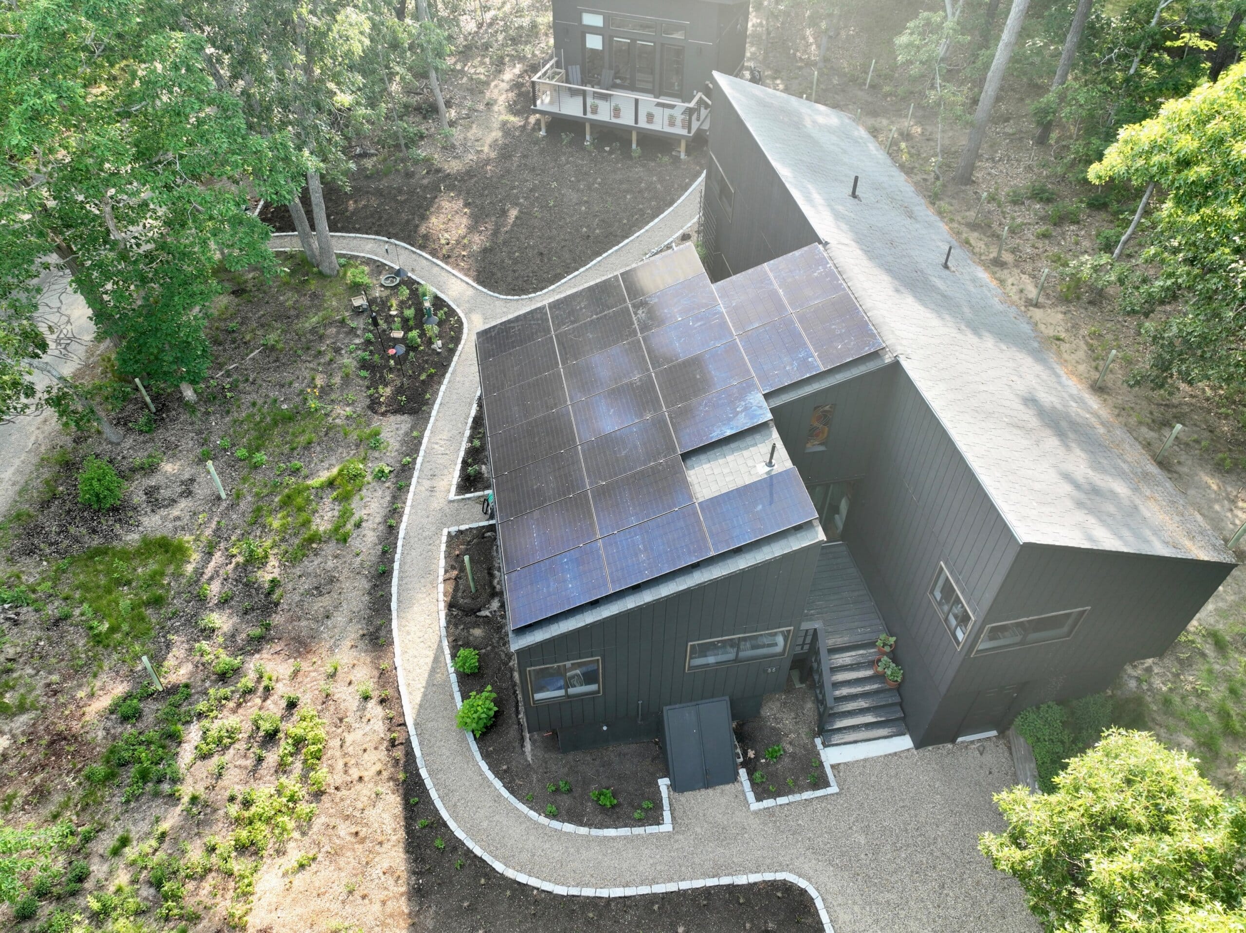 house with angular roof and solar panels