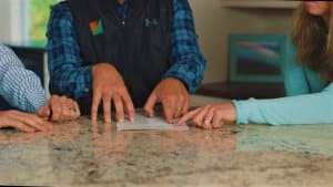 My Generational Energy solar consultant discussing financial benefits with two clients