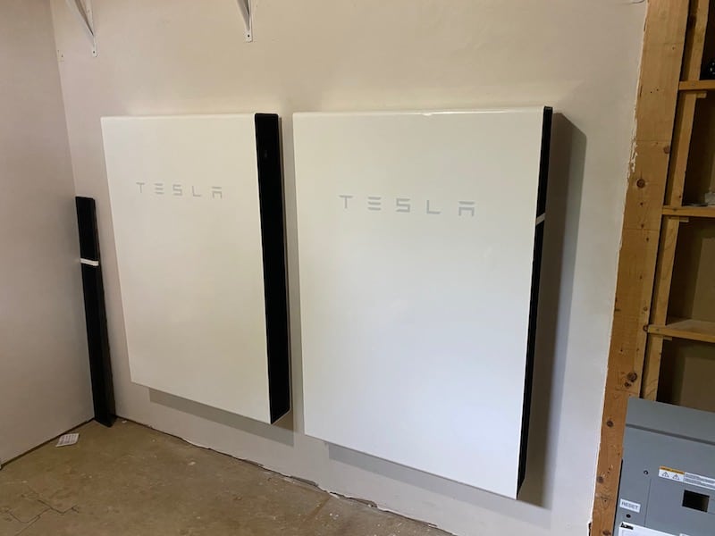 Two Tesla Powerwall solar batteries wall mount install