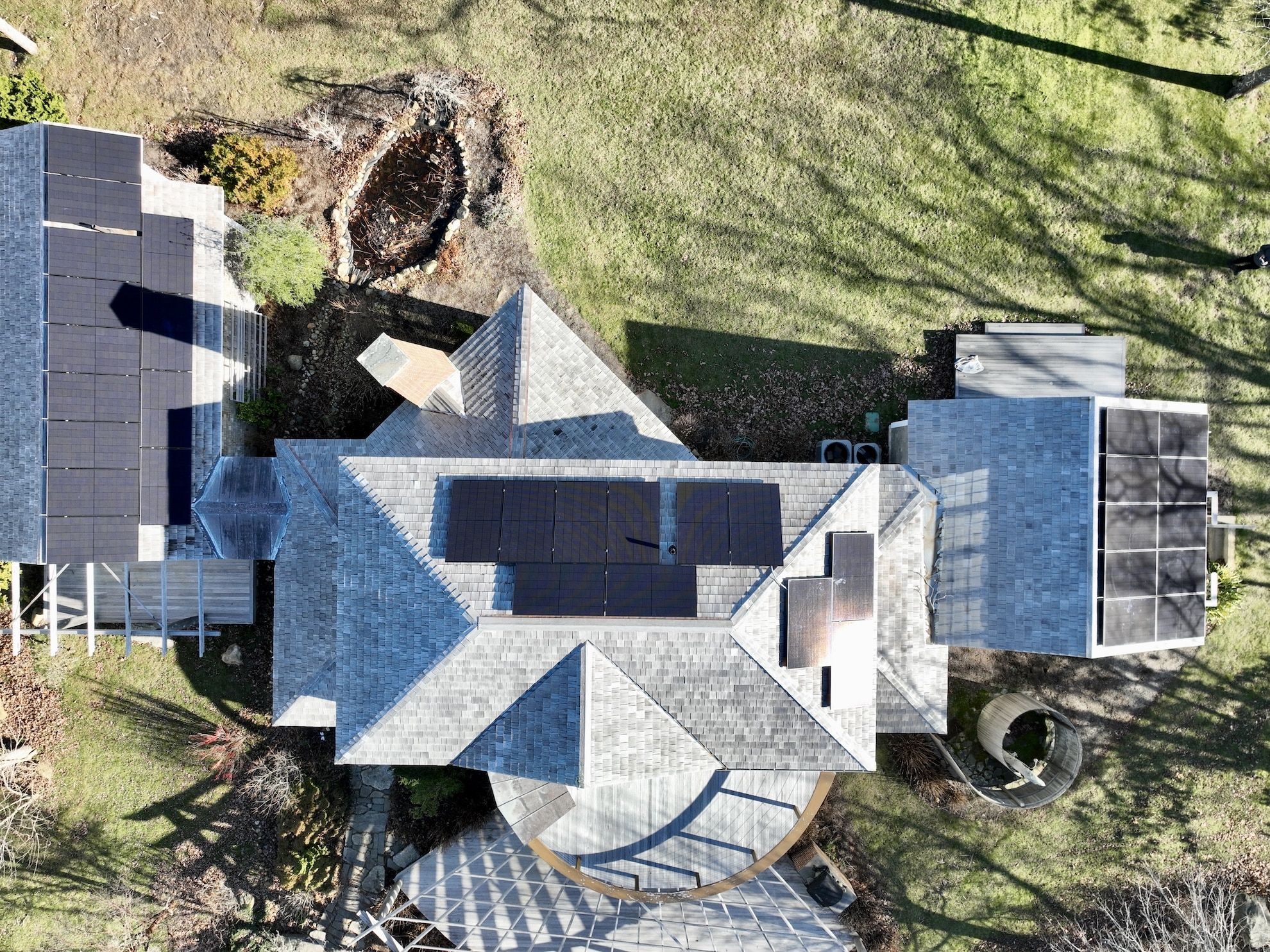 Grey roof on house with all black solar panels